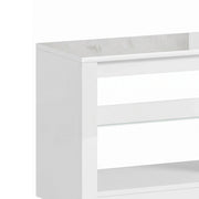 Close-up of the white TV stand's glossy top and corner edge