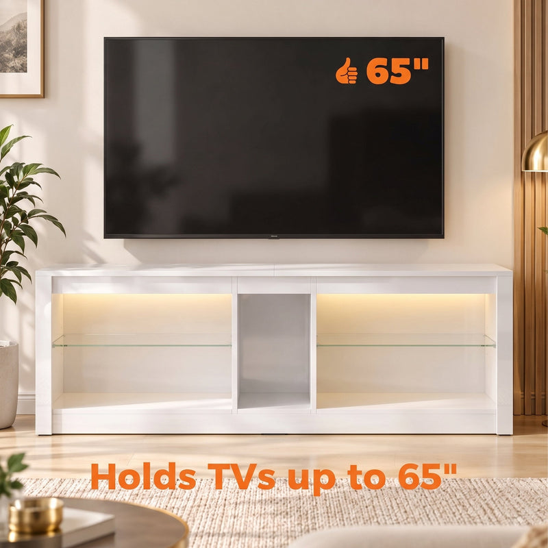 White TV stand under a wall-mounted 65 inch TV with the text holds TVs up to 65 inches
