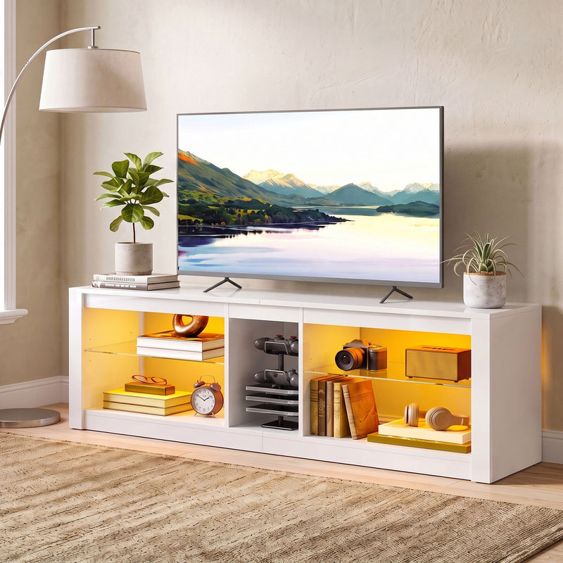 White TV stand at an angle beside a floor lamp with a TV on top and books on the shelves