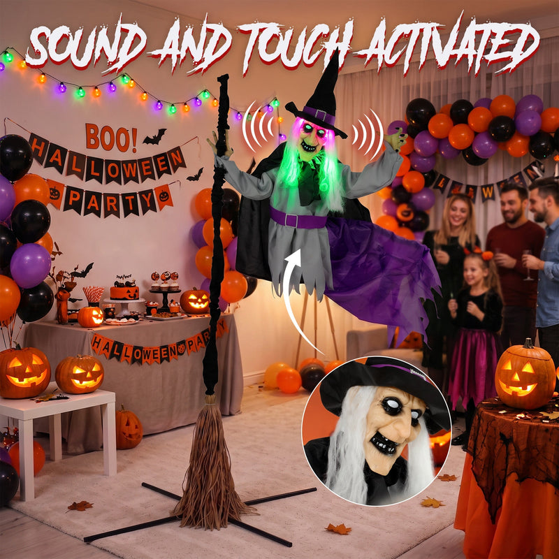 Flying witch decoration hovering over guests at an indoor Halloween party