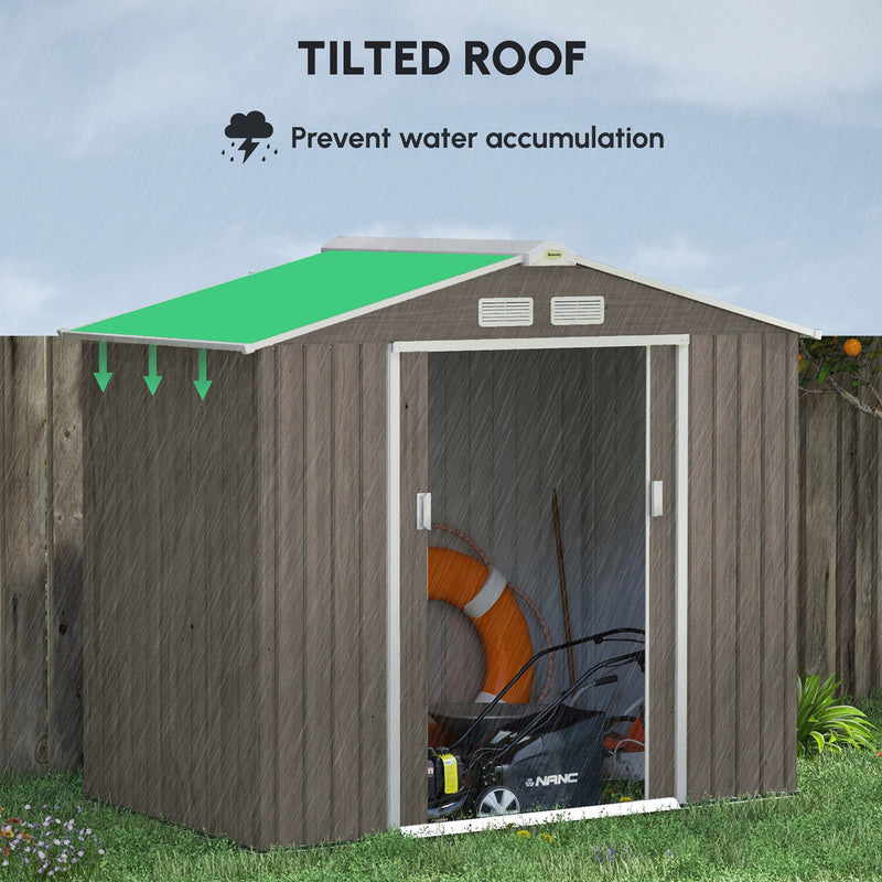 Sloped apex roof highlighted in green, directing rainwater away from the light brown shed