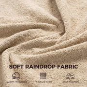 Close-up of the soft raindrop velvet fabric texture on the rocking chair