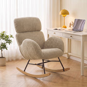 Rocking chair placed beside a desk and lamp in a home office corner