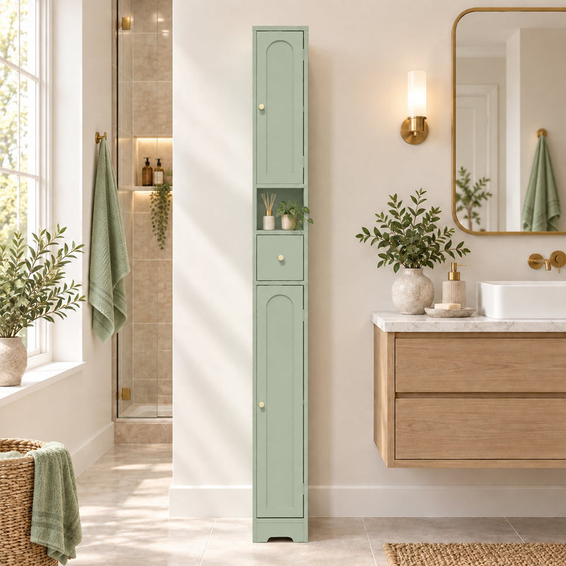 Light green cabinet in a bathroom beside a wall-mounted vanity and a mirror