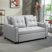 Light grey sofa bed in a bright living room with a bookshelf