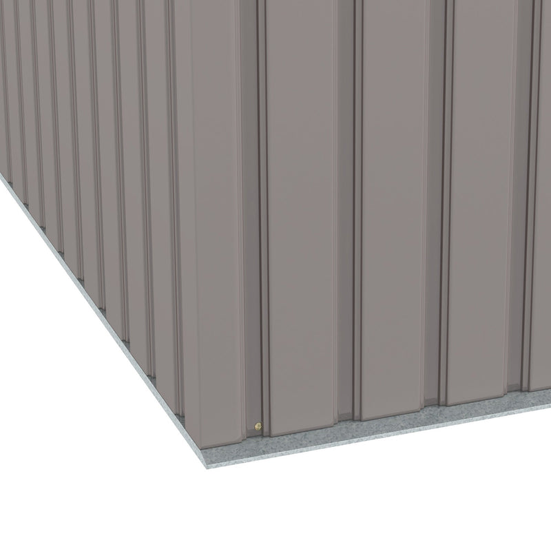 Close-up of the corner where the ribbed wall panels meet the base of the shed