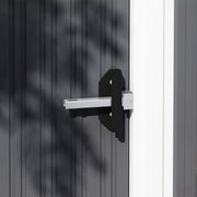 Close-up of the sliding door latch plate, which takes a padlock through the hasp