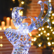Close-up of the illuminated reindeer head and antlers