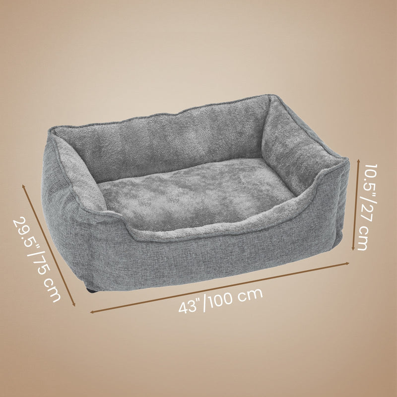 Close-up of the woven linen-look fabric texture on the dog bed