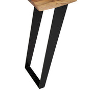 Close-up of the matt black angular iron leg of the acacia console table