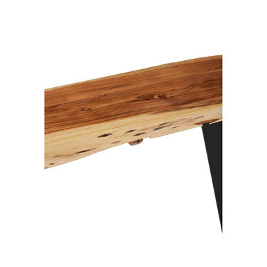 Detail shot of the joint where the black iron base meets the solid acacia top