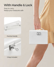 Woman carrying the closed white jewellery box by its handle, with close-ups of the handle and 2 keys