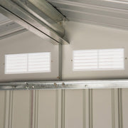 Interior of the steel grey shed showing the roof beam and two wall vents
