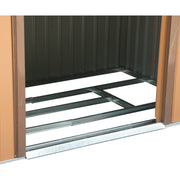 View through the shed doorway onto the steel foundation frame