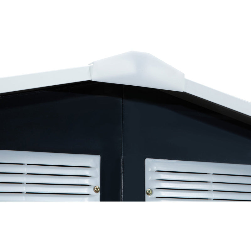 Close-up of the white ridge cap above two front ventilation louvres
