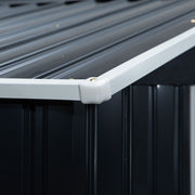 Close-up of the roof eaves trim meeting the corrugated wall panel