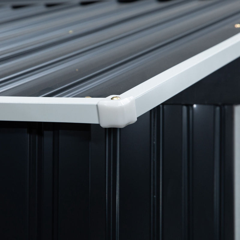 Close-up of the roof eaves trim meeting the corrugated wall panel