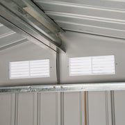Interior roof view with support beams and two ventilation louvres