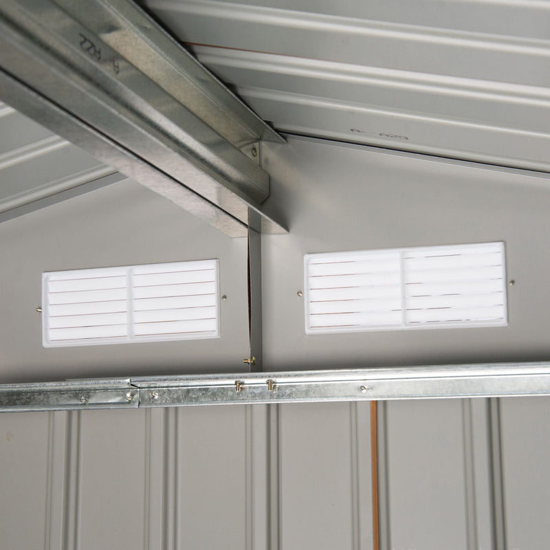 Interior roof view with support beams and two ventilation louvres