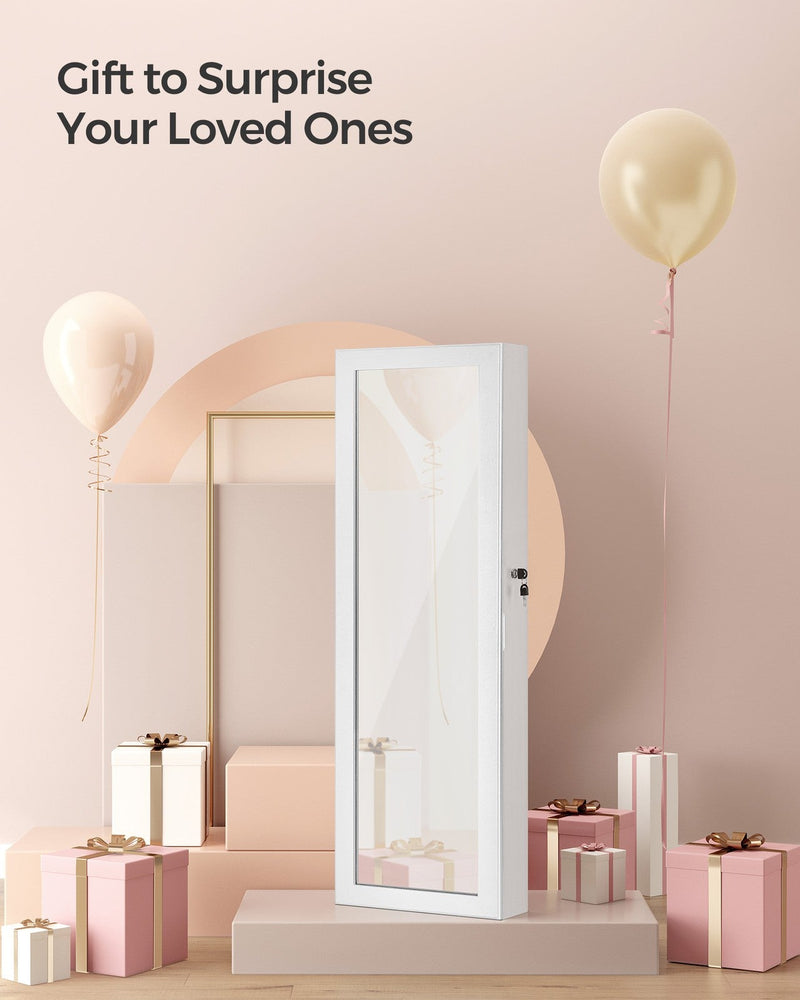 The closed cabinet styled as a gift with balloons and wrapped presents