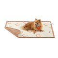 Feandrea medium beige waterproof sherpa fleece dog blanket with a dog sitting on it