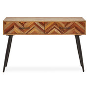 Mango wood two drawer console table with black iron legs on a plain background