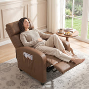 Woman reclining in the dark brown recliner armchair beside a window with a coffee table