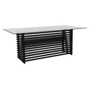 Front view of the 6 seater glass dining table on a plain background