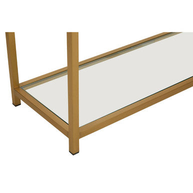 Detail of the matte gold foot where the console table frame meets the floor