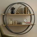 Matte gold and grey two tier round frame wall shelf in a room