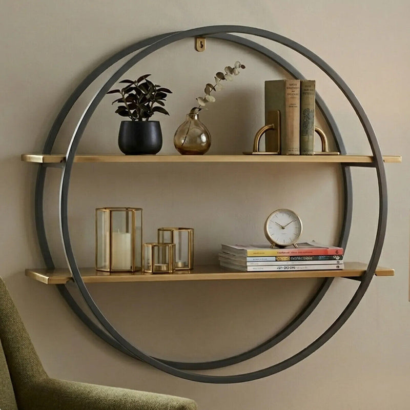 Matte gold and grey two tier round frame wall shelf in a room