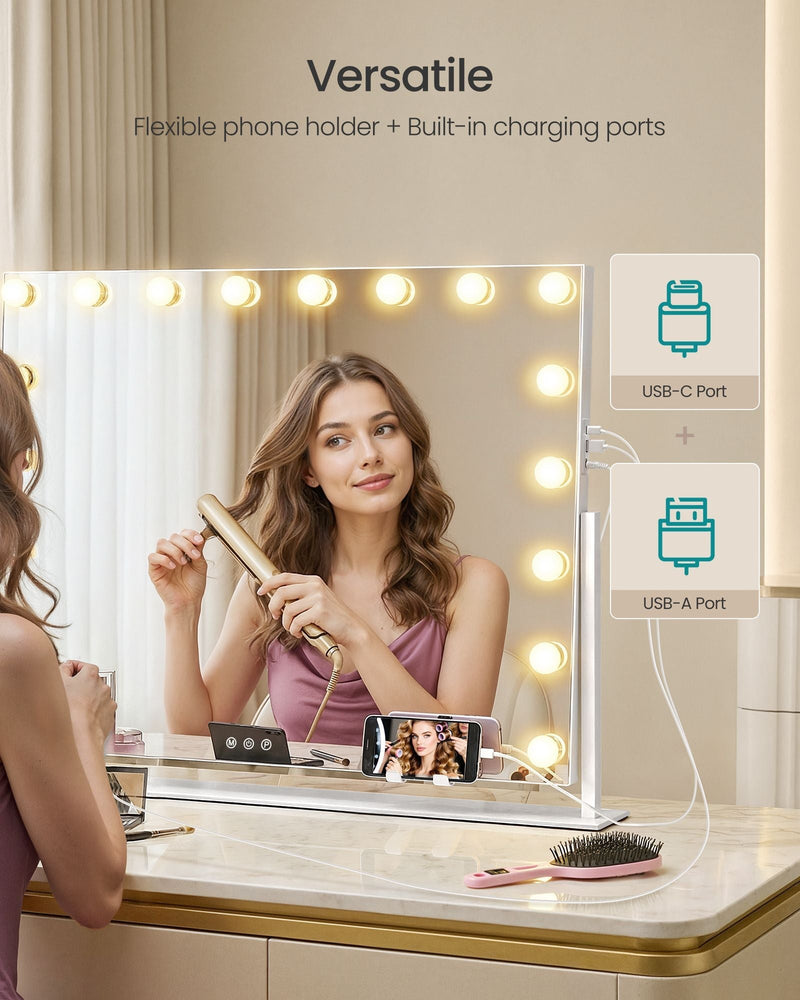 Vanity mirror in use with USB-C and USB-A ports charging a phone in the holder