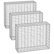 Three empty metal gabion cages shown stacked front to back