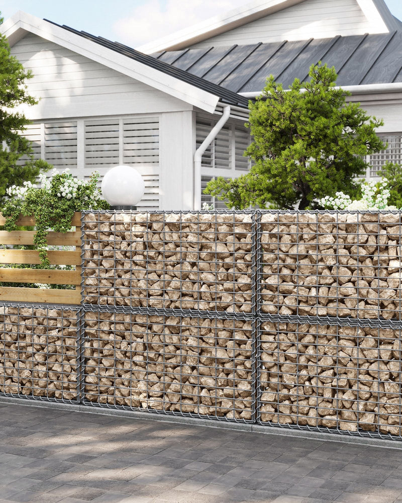 Songmics gabion cage wall used as a garden boundary in front of a house