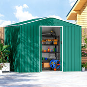 Green metal shed on a patio with doors open, hose reel and mower stored inside
