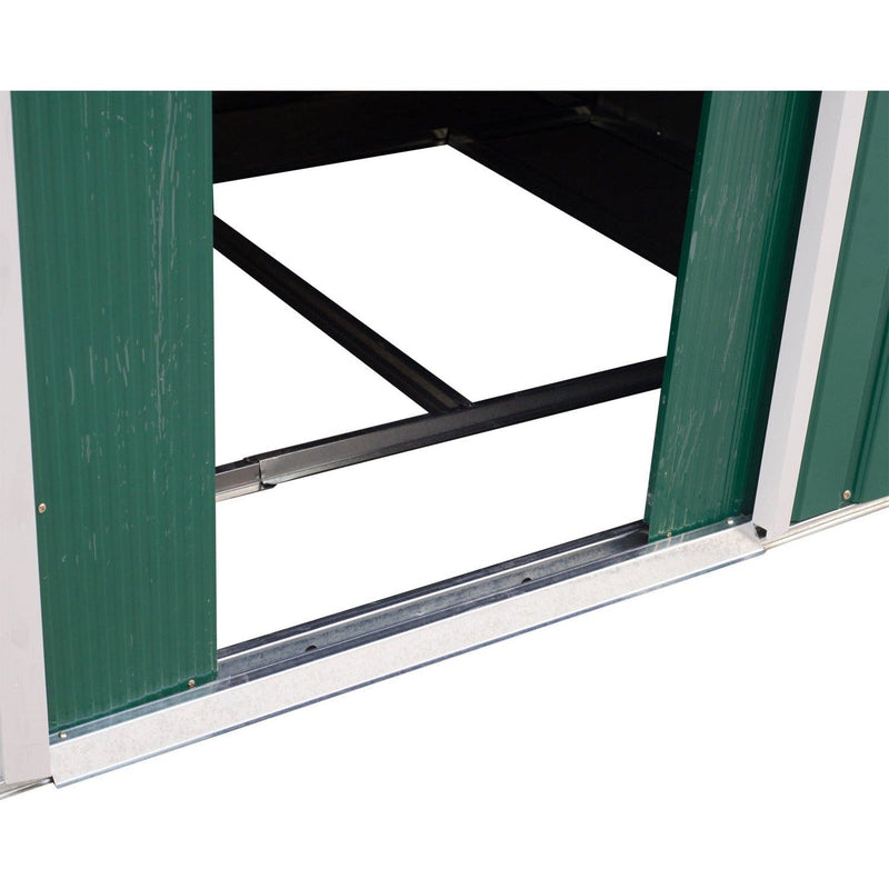Green sliding door pushed open showing the bottom running track and black steel base frame