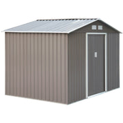 Grey metal garden shed with apex roof and closed sliding doors, angled studio view
