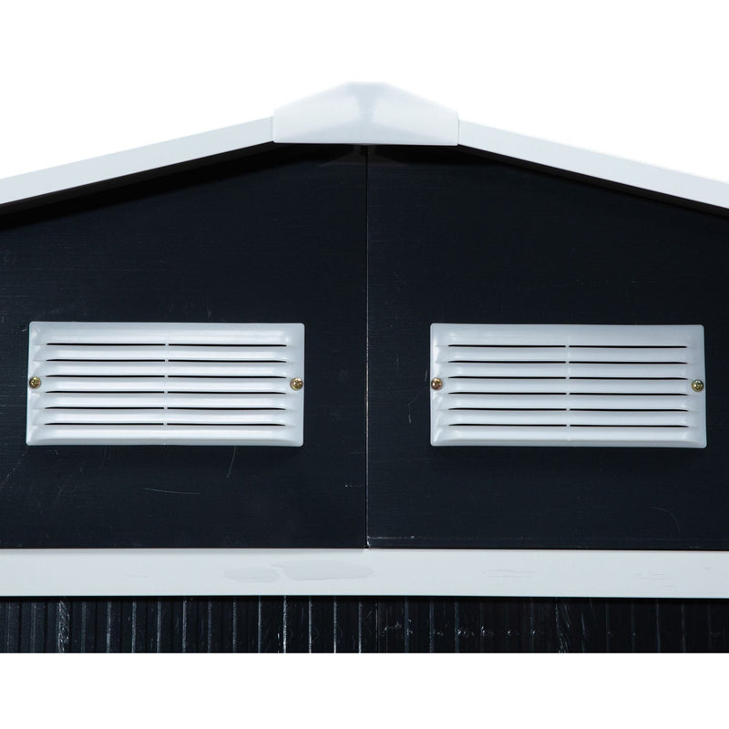 Close-up of two white louvred ventilation panels on the dark grey shed gable end
