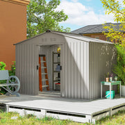 9x6ft silver grey metal shed on a decked patio with its sliding doors open