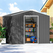 Dark grey metal shed on a patio with doors open, hose reel and mower stored inside