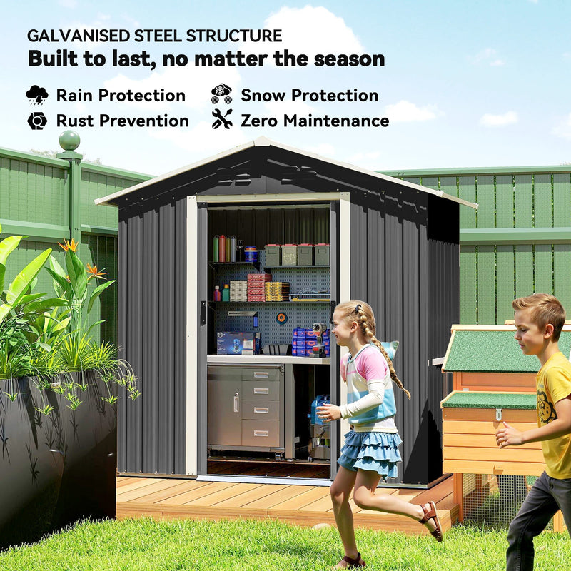 Galvanised steel panels of the dark grey shed shown resisting rain, snow and rust
