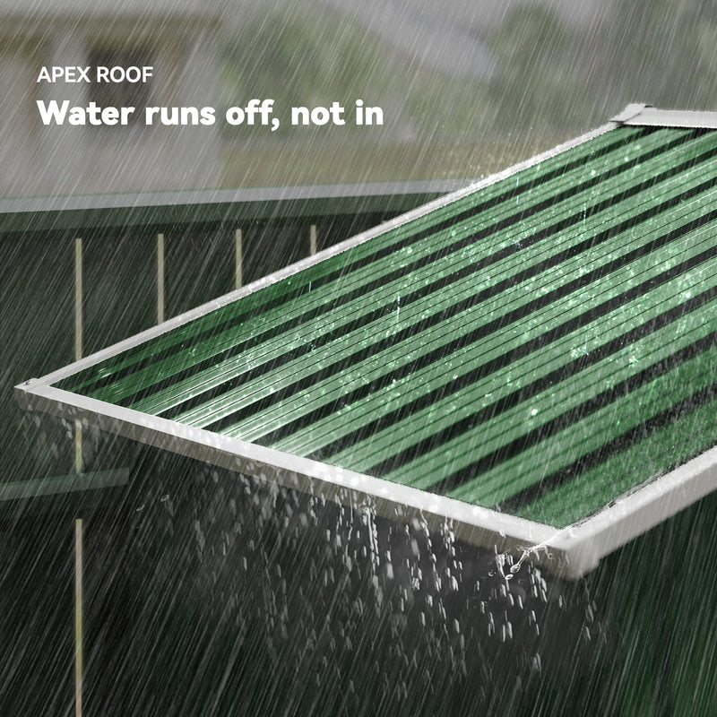 Apex roof of the green metal shed with rain running off the sloped panels