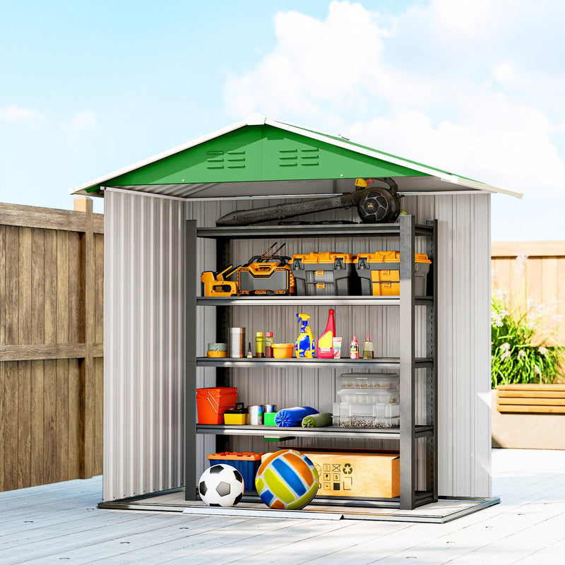 Green metal shed open beside a wooden fence, filled with tools, tins and boxes