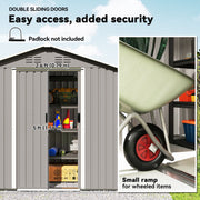 Double sliding doors with a 79cm wide, 156cm high opening and a threshold ramp for a wheelbarrow
