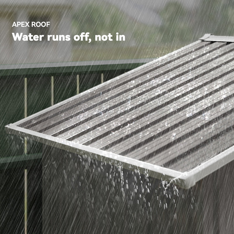 Rain running off the shed's apex roof, showing how water sheds to both sides