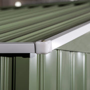 Close-up of the light green roof eaves corner cap