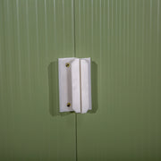 Close-up of the white door handle and padlock hasp on the sliding doors