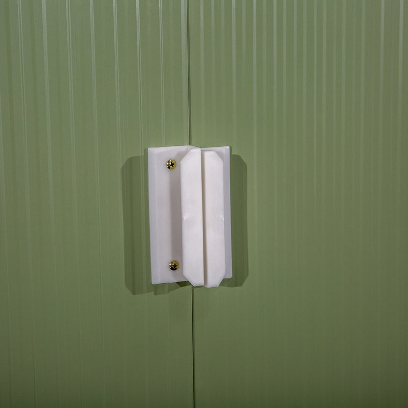 Close-up of the white door handle and padlock hasp on the sliding doors
