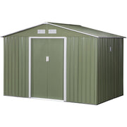 Light green shed studio view from the front right with the doors closed