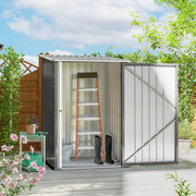 Grey lean-to shed open on a garden deck with a step ladder and wellington boots stored inside